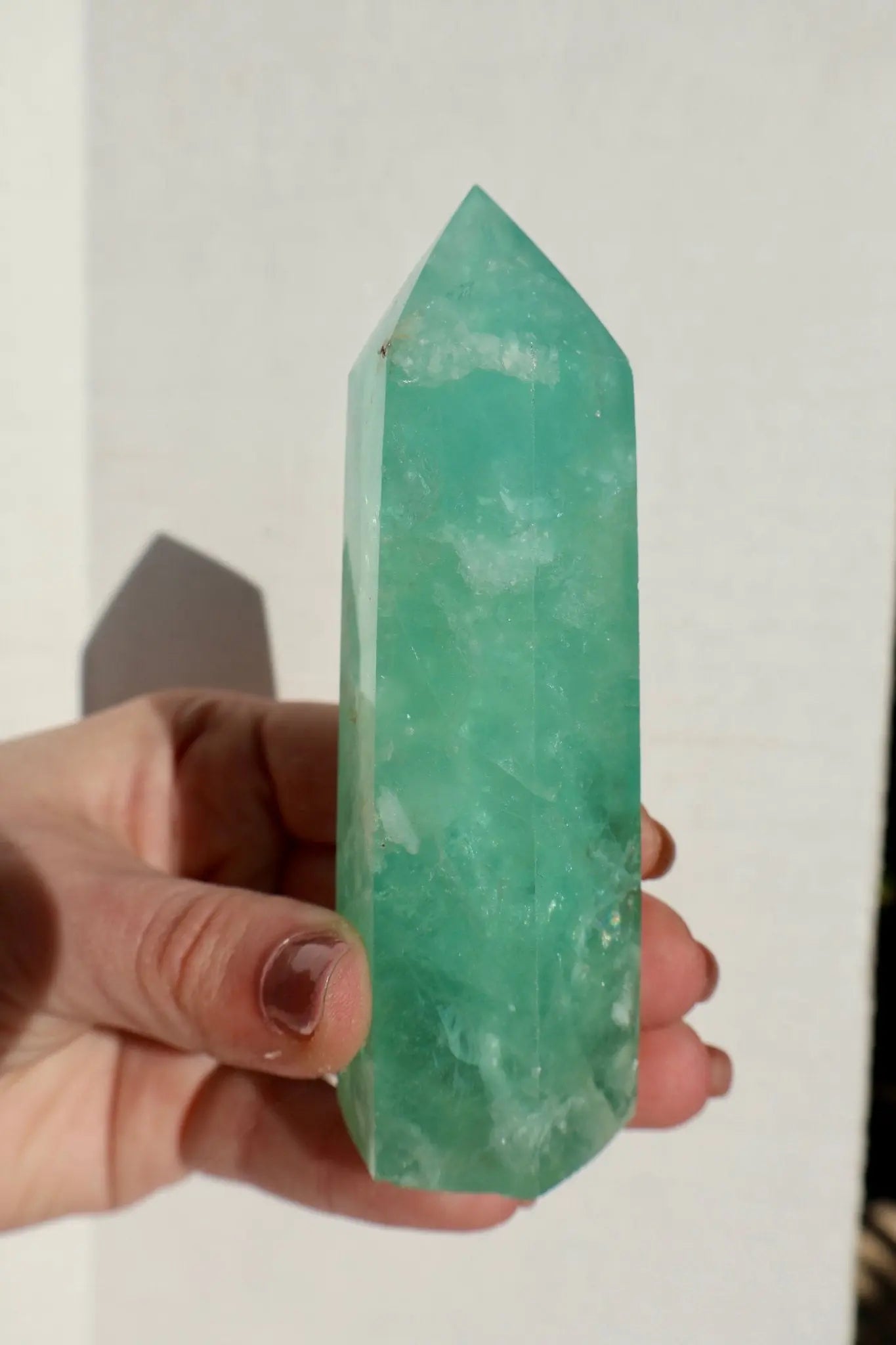 textured Fluorite Obelisk, Icey Seafoam Green Crystal 3-4" in close-up shot