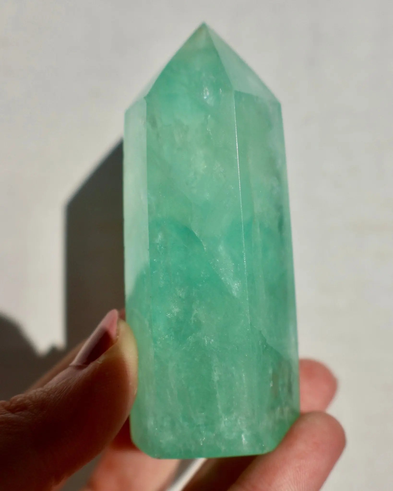 textured Fluorite Obelisk, Icey Seafoam Green Crystal 3-4" in lighting effect