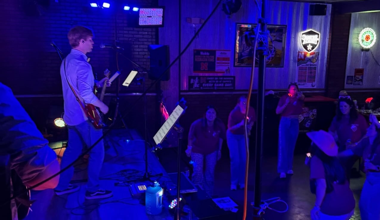 Fans dance while Harry Norman sings