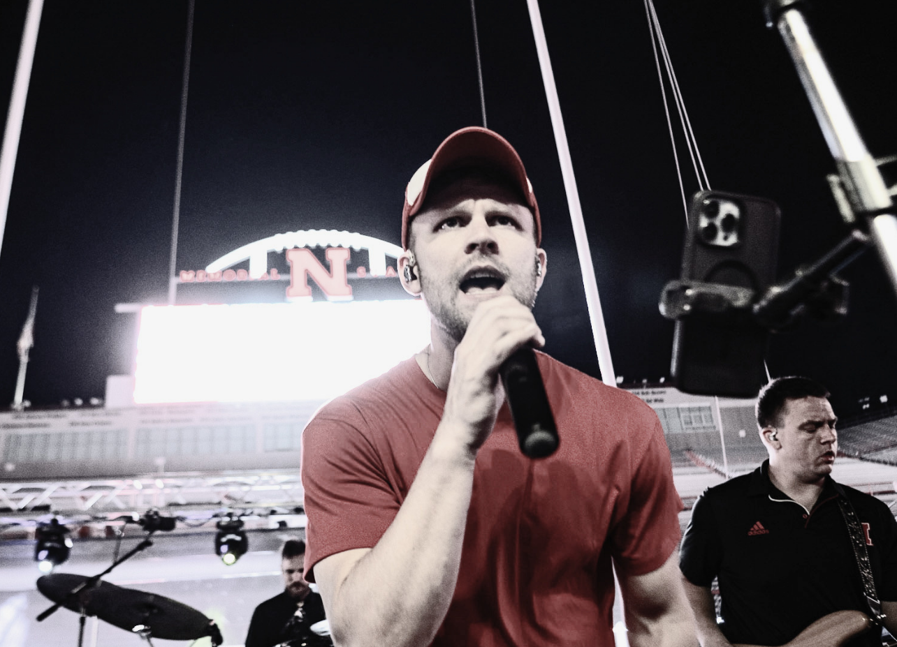 Harry Norman sings lead vocals at a show in Memorial Stadium in Lincoln, NE